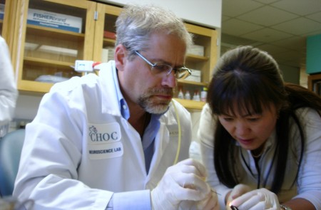 Two scientists collaborating in the lab