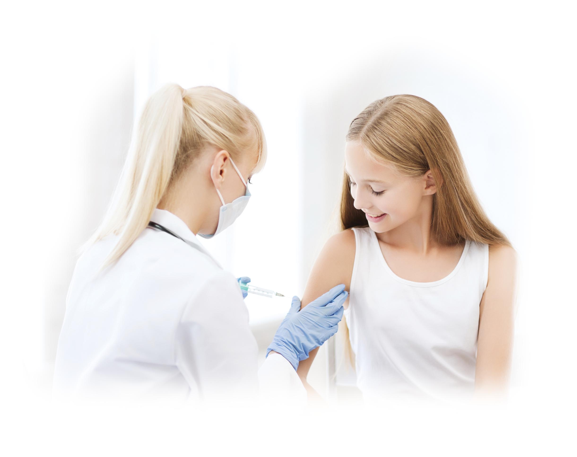 Medical staff giving a young girl a vaccination shot